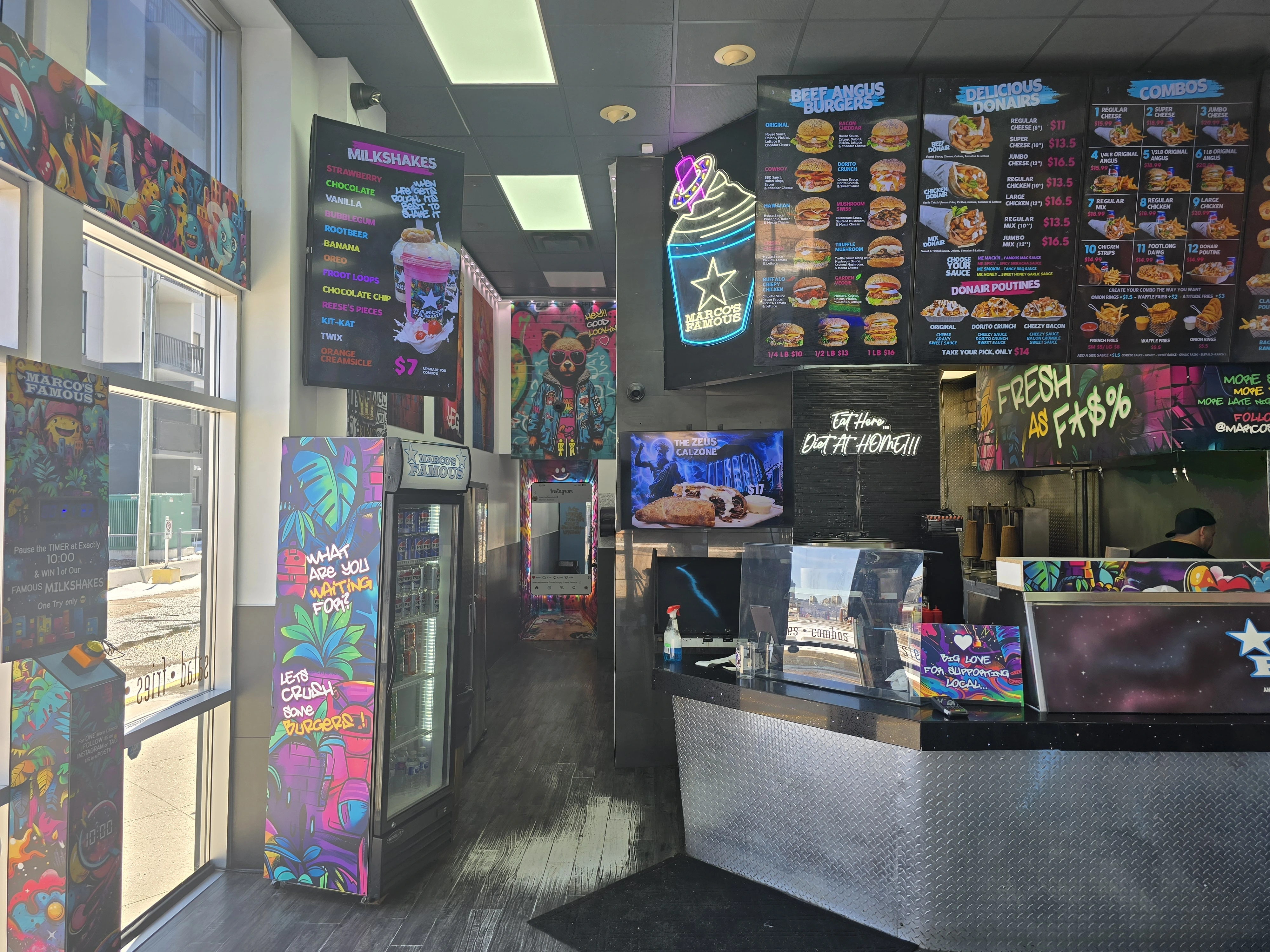 Inside Marcos Famous with counter and dining area in Edmonton