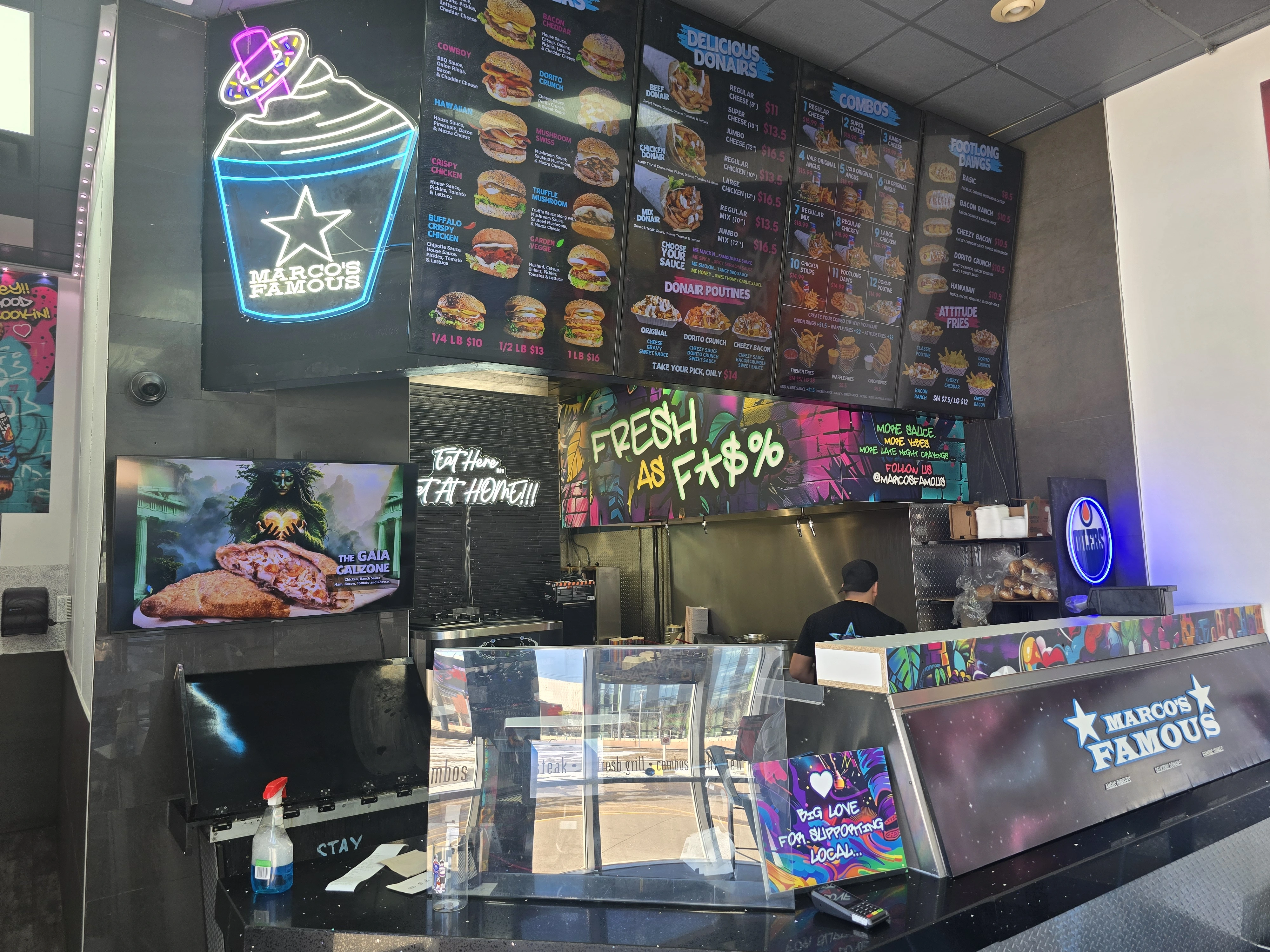 Interior seating and atmosphere at Marcos Famous in Edmonton